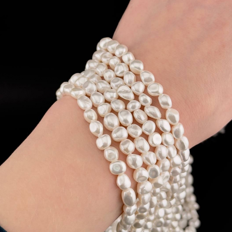 Майорка цвет белый средний размер бусин 7*6мм